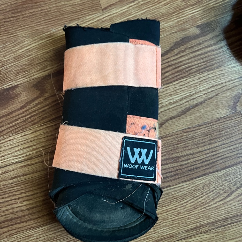 Large pair woof wear brushing boots